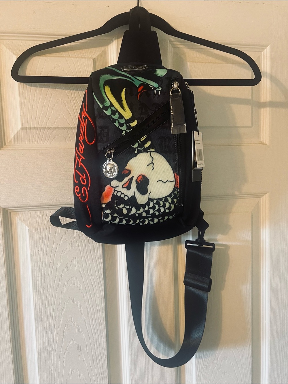 Ed Hardy Black Skull Sling Bag with Red and Green Accents
